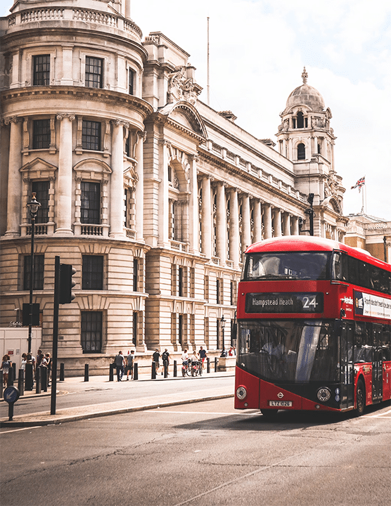 a bus driving through a city